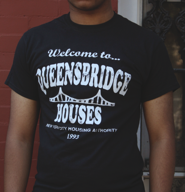 Man wearing black Queensbridge T-shirt
